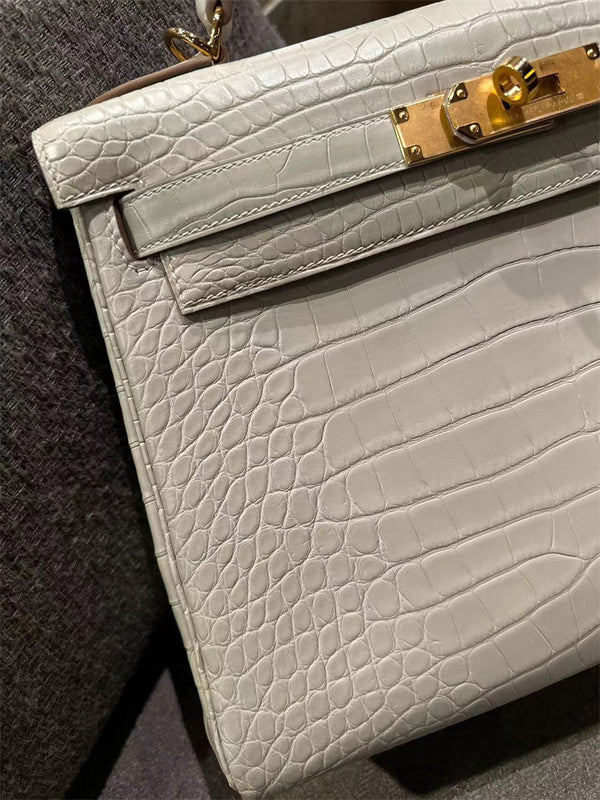 Side view of sleek structured handbag