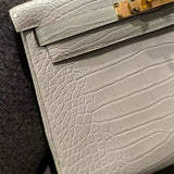 Side view of sleek structured handbag