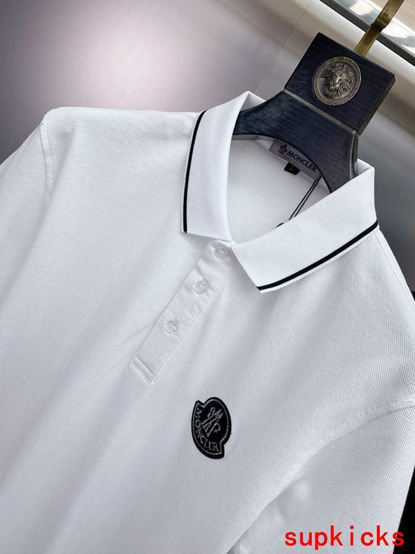 Full styled look of Moncler luxury clothing with logo-detail design