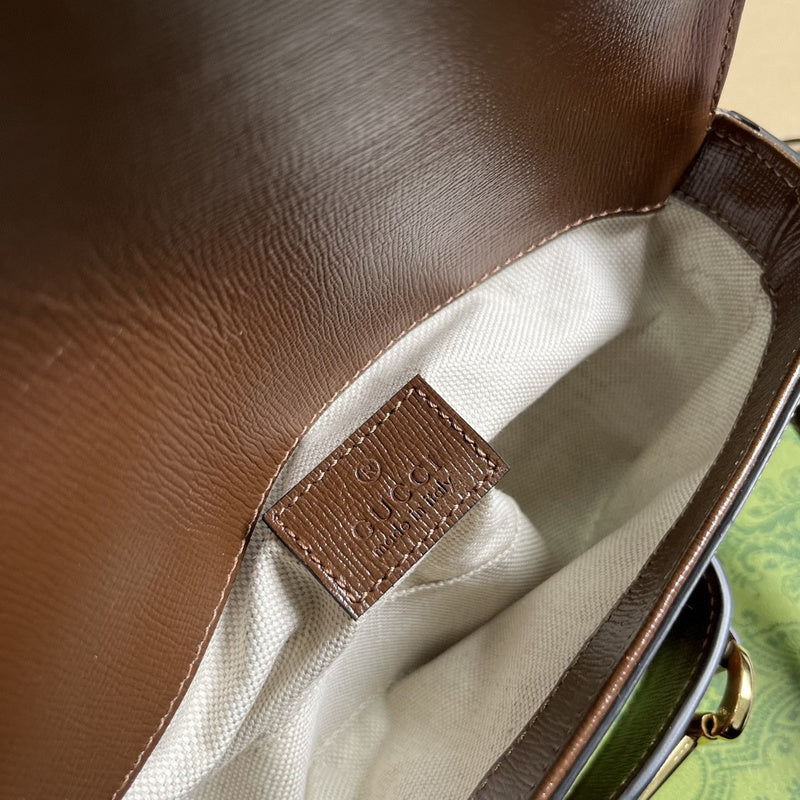 Side profile of sleek polished women's handbag – women's everyday handbag