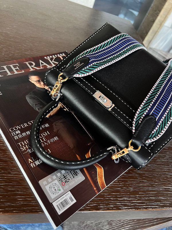 Side view of streamlined structured handbag