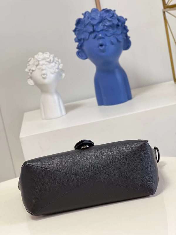 Close-up detail of classic sleek women's handbag – women's designer-style accessory