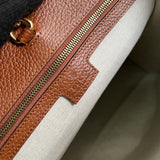 Side profile of premium refined women's handbag – women's luxury handbag