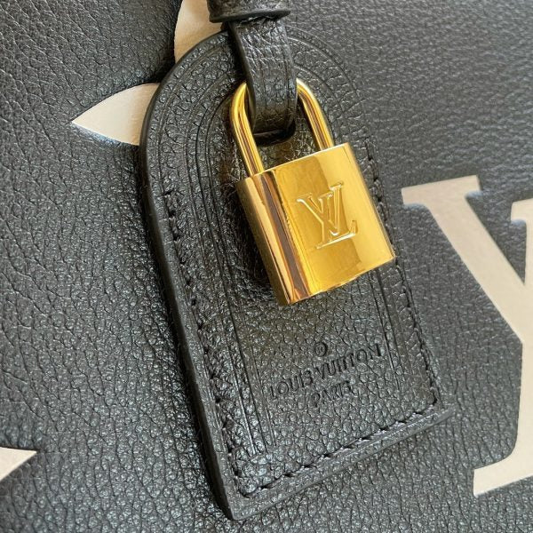 Handle and strap detail of chic signature women's handbag – women's premium purse