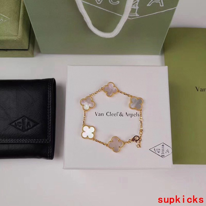 Lifestyle view of Van Cleef & Arpels unisex jewelry piece