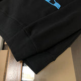 Front view of Louis Vuitton luxury clothing with tailored silhouette