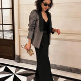 Side view of sleek structured handbag