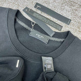 Texture and finish detail of Amiri luxury piece style No.110