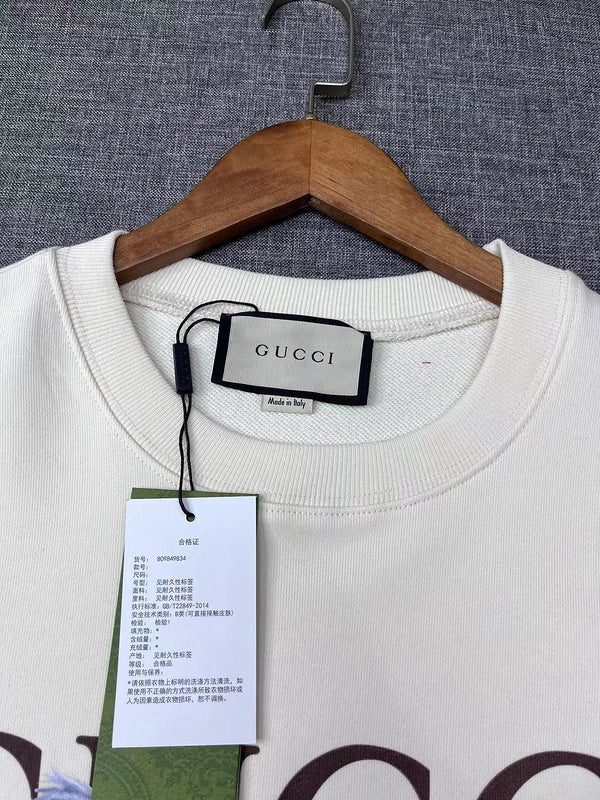 Back view of Gucci luxury clothing with signature branding