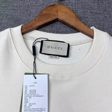 Back view of Gucci luxury clothing with signature branding