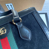Styled lifestyle shot of premium signature women's handbag – women's designer-style accessory