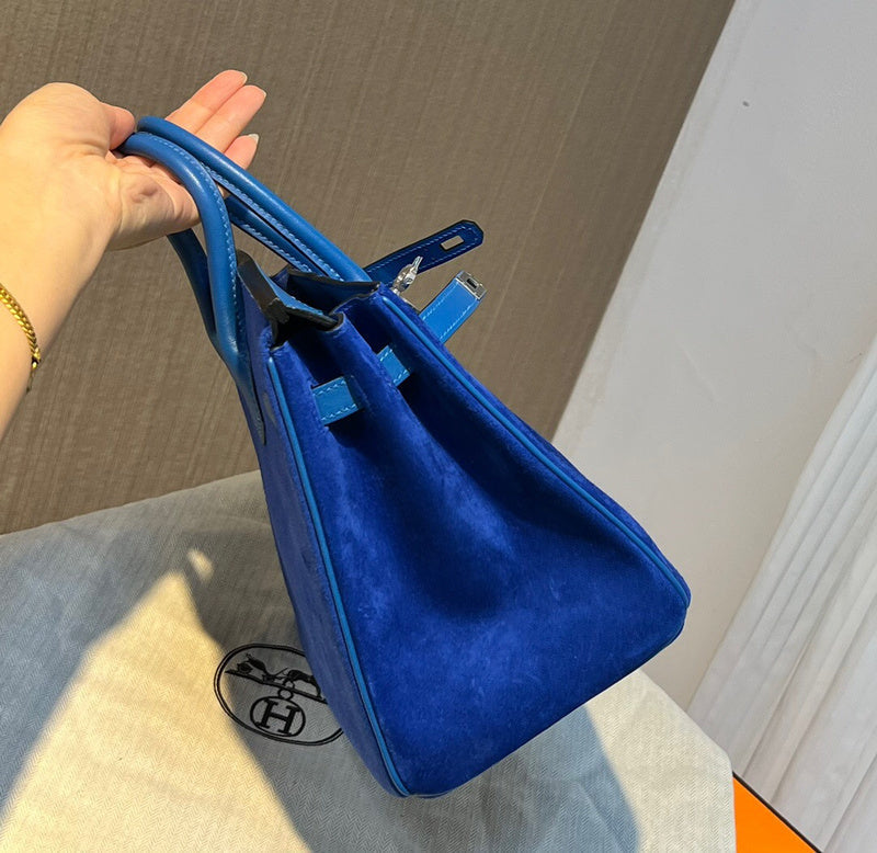 Side view of classic structured handbag