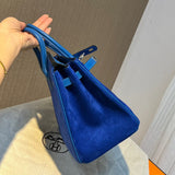 Side view of classic structured handbag