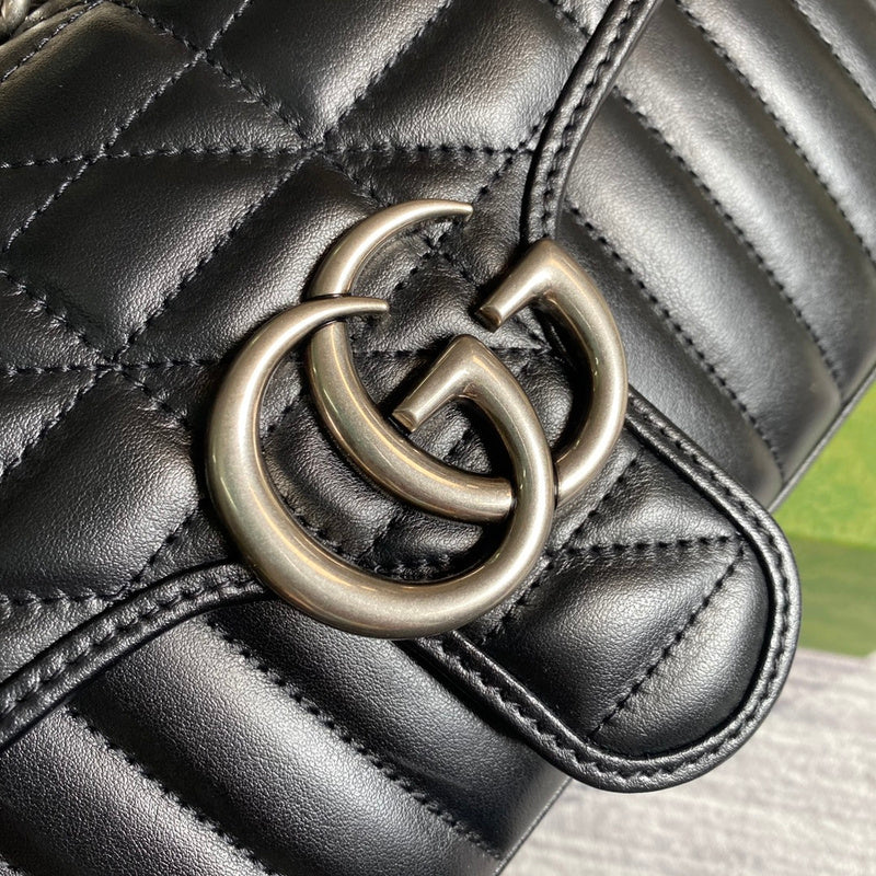 Back view of polished signature women's handbag – women's luxury accessory