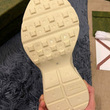 Side profile of Gucci muted earth tones sneakers low-top design