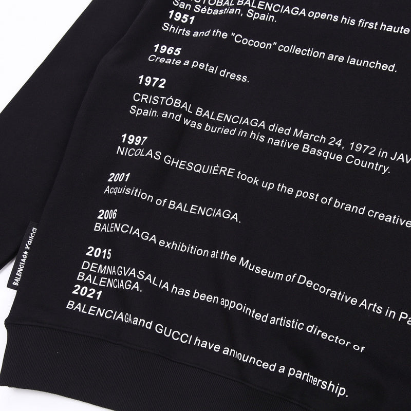 Close-up detail shot of Gucci luxury clothing with signature branding
