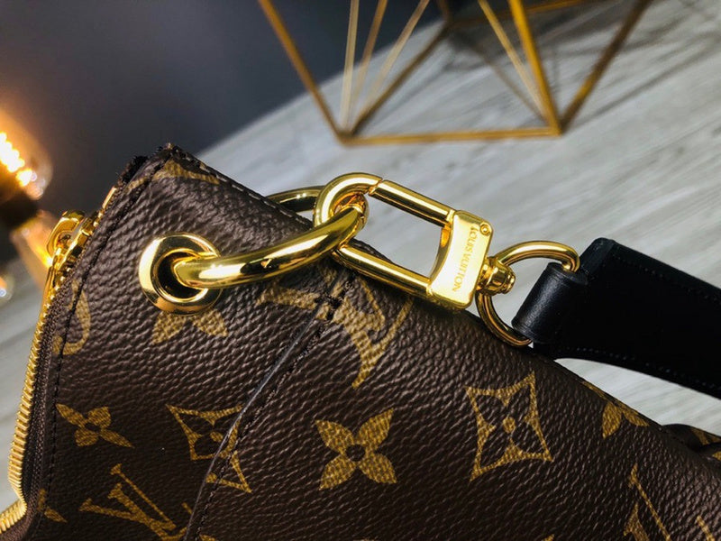 Side profile of polished structured women's handbag – women's luxury accessory