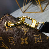 Side profile of polished structured women's handbag – women's luxury accessory