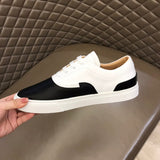 Hermès Beige High-Top Sneakers - Angled View