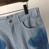Full styled look of Louis Vuitton luxury clothing with logo-detail design