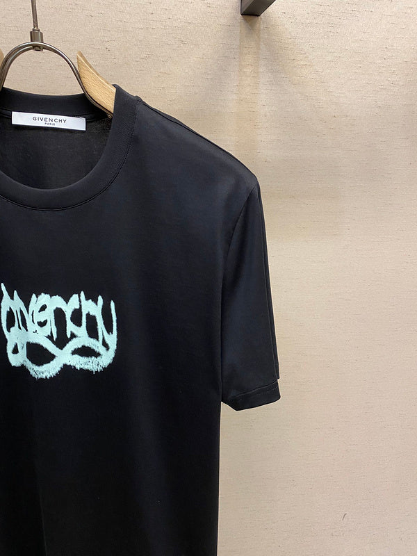 Flat lay presentation of Givenchy luxury clothing with contemporary cut