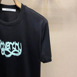 Flat lay presentation of Givenchy luxury clothing with contemporary cut