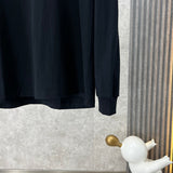 Back view of Louis Vuitton luxury clothing with logo-detail design