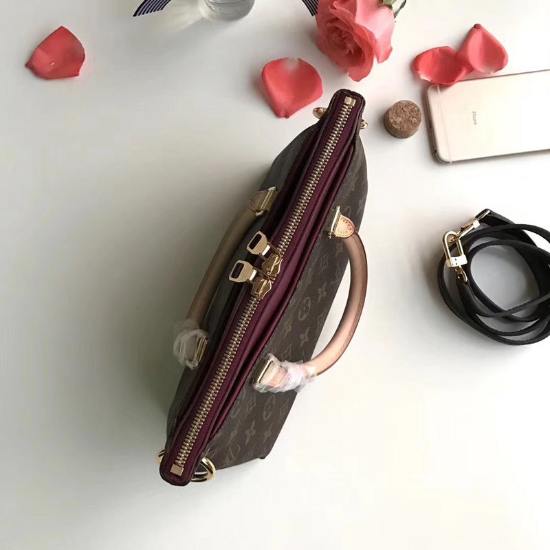 Styled lifestyle shot of signature everyday-luxe women's handbag – women's statement bag