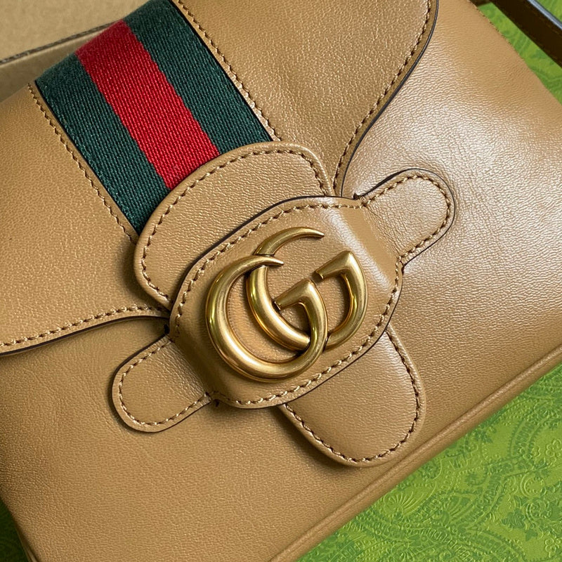 Handle and strap detail of everyday-luxe chic women's handbag – women's designer-style accessory