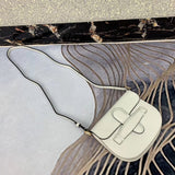 Front view of modern polished women's handbag – women's everyday handbag