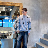 Front view of Louis Vuitton luxury clothing with monogram-inspired silhouette