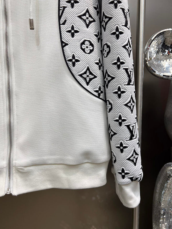 Front view of Louis Vuitton luxury clothing with label-forward styling