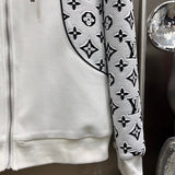 Front view of Louis Vuitton luxury clothing with label-forward styling