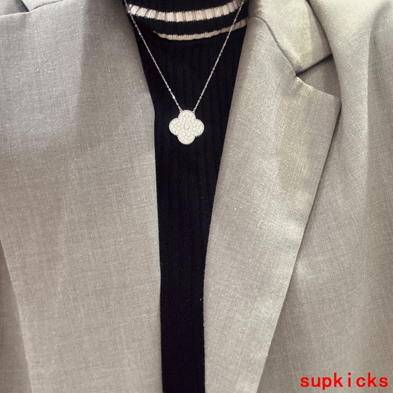 Close-up detail view of Van Cleef & Arpels unisex jewelry piece