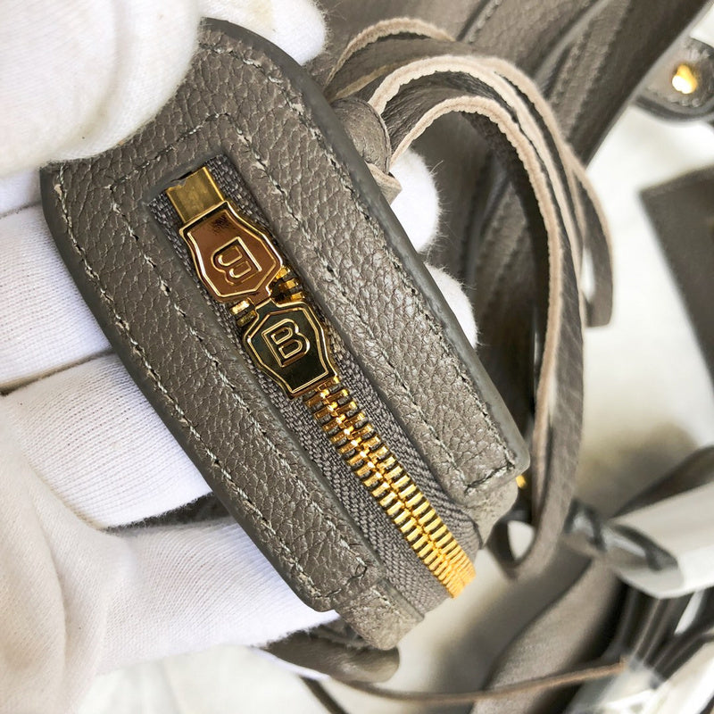 Styled lifestyle shot of polished structured women's handbag – women's designer-style accessory