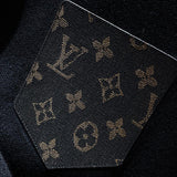 Flat lay presentation of Louis Vuitton luxury clothing with relaxed-fit cut