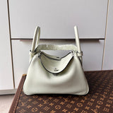  Timeless top-handle bag carried on shoulder 28