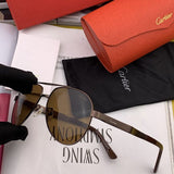 Close-up detail view of Cartier unisex sunglasses