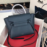 Side profile of polished signature women's handbag – women's luxury accessory