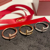 Close-up detail view of Cartier unisex jewelry piece