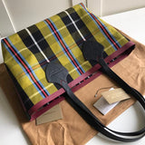 Ziva's Charm handbag – side angle view (one versatile size)