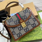 Handle and strap detail of structured modern women's handbag – women's designer-style accessory