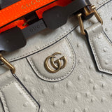 Handle and strap detail of signature structured women's handbag – women's luxury accessory