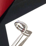 Side view of Cartier unisex jewelry piece