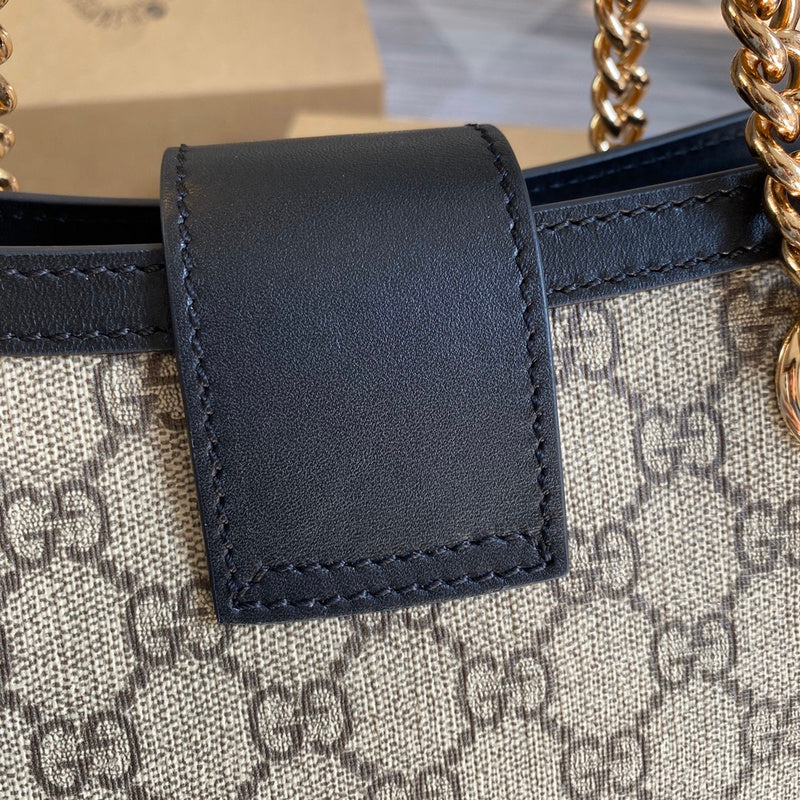 Handle and strap detail of classic refined women's handbag – women's premium purse
