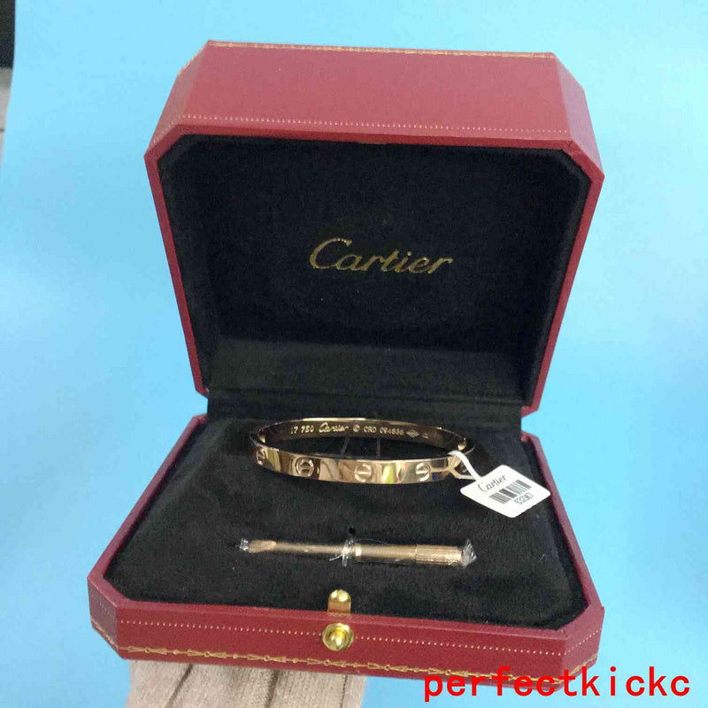 Close-up detail view of Cartier unisex jewelry piece