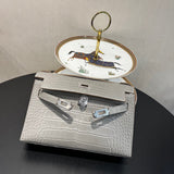 Side view of curated structured handbag