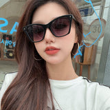 Close-up detail view of Louis Vuitton unisex sunglasses