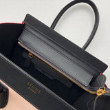 Side profile of modern structured women's handbag – women's luxury accessory