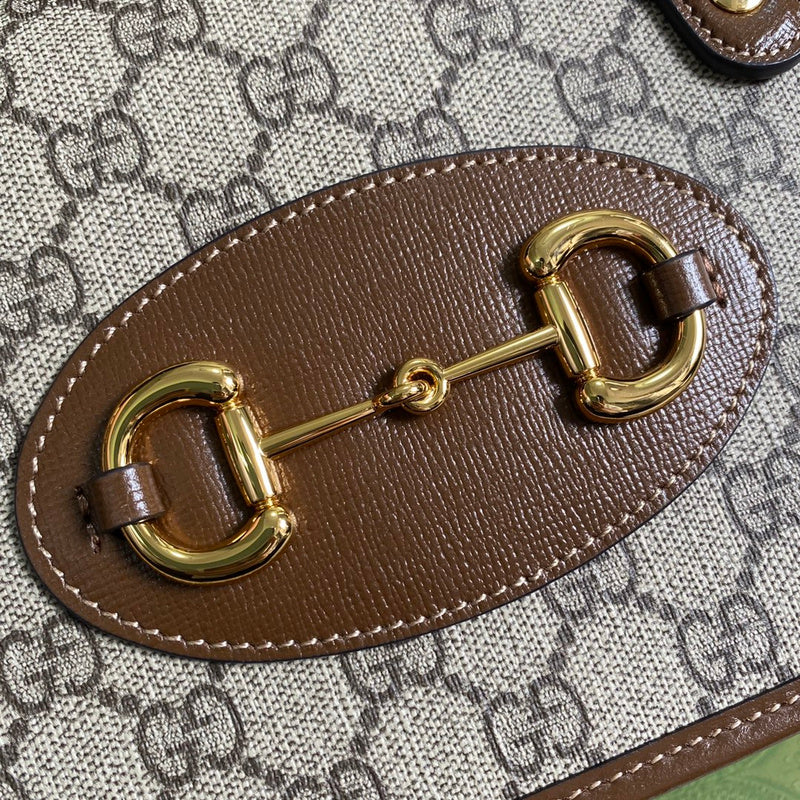 Styled lifestyle shot of signature chic women's handbag – women's luxury handbag
